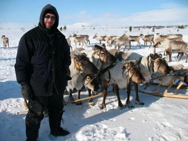 Chris Atkins with reindeer in Siberia