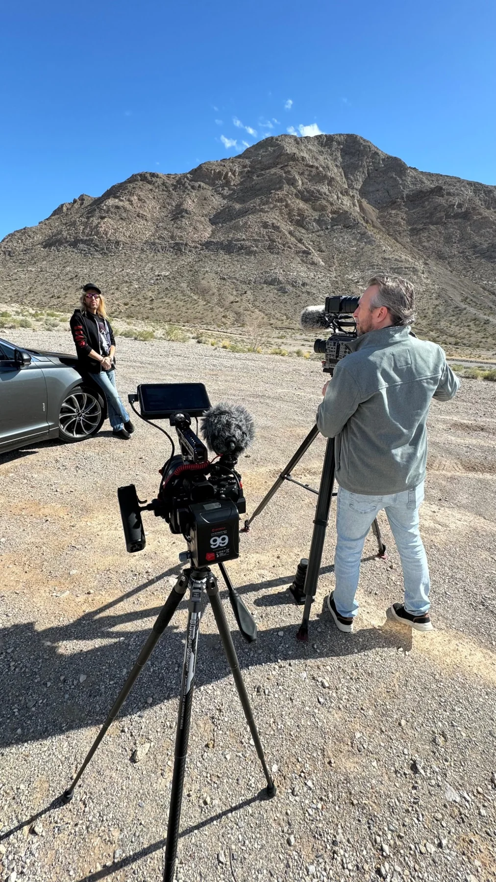 Chris Atkins operating a camera during Stryper documentary production